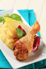 Roasted chicken drumstick and mashed potato