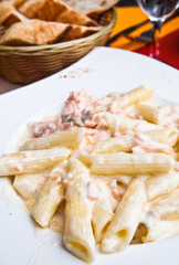 close-up of plate of pasta and smoked salmon