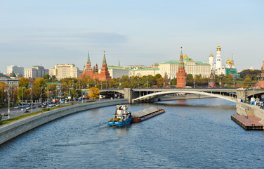 Moscow Kremlin and barge on river Moskva in a sunny day