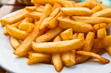 Golden French fries potatoes ready to be eaten