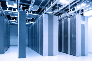 shot of network cables and servers in a technology data center