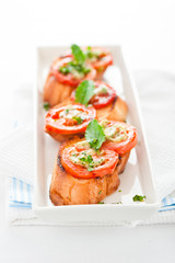 Bruschetta - gold baked baguette with tomato garlic and basil as