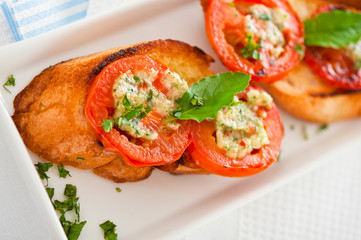 Bruschetta - gold baked baguette with tomato garlic and basil as