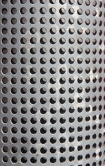 metal holed or perforated grid background