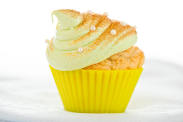 Christmas tree cupcake with gold powder and decoration