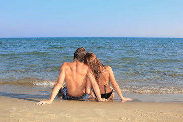 Portrait of happy couple  on the beach