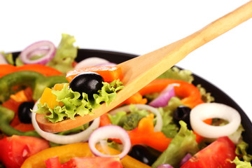 delicious vegetables on a wooden spoon