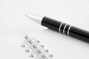Fototapeta premium Notebook and pen close-up