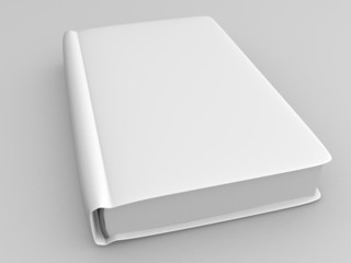 white closed book on gray background