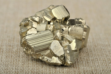 pyrite in the background of a burlap