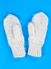 a pair of knitted wool mittens