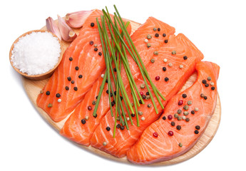 Fresh slices of  salmon with color pepper, garlic, chives