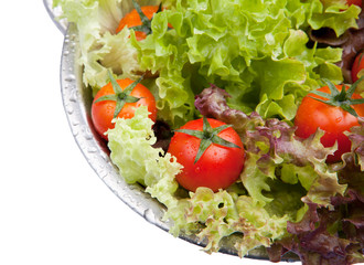 Washed fresh tomatoes with salad