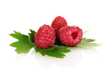 beautiful raspberries and leaves isolated on white