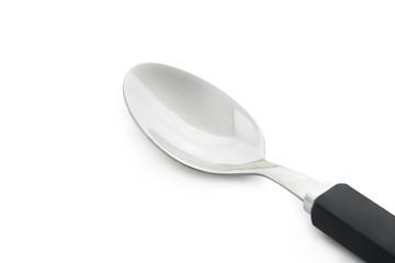 closeup steel spoon isolated on white background