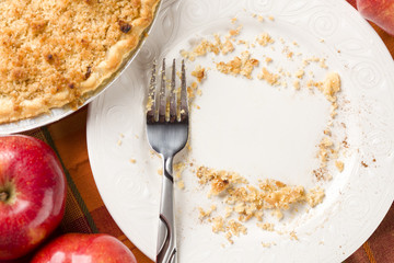 Overhead Flat Lay Mockup of Pie, Apples and Copy Spaced Crumbs on Plate © Andy Dean