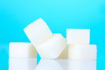 refined sugar on blue background