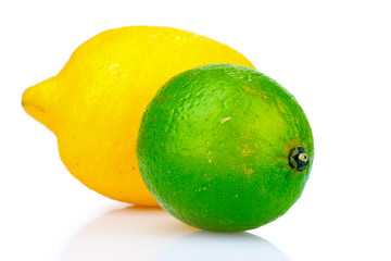 fresh lime and lemon isolated on white
