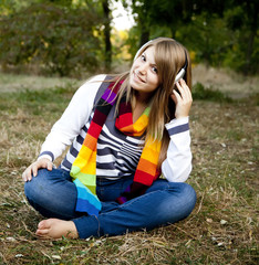 Portrait of girl with headphones at outdoor.