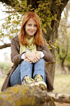 Beautiful girl at outdoor in autumn time
