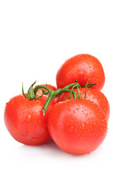 Ripe red tomatoes isolated on white