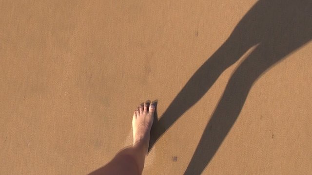 subjective shot woman feet playing ocean 60
