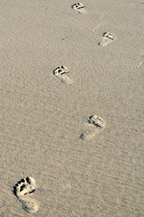 Fußspuren am Strand
