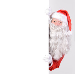 Santa Claus holding a blank sign