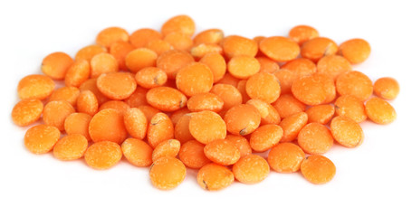 Lentil with selective focus over white background