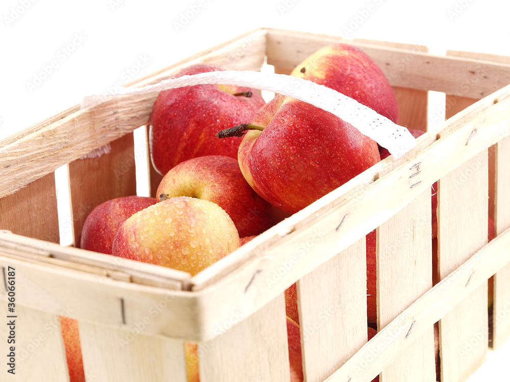 Poster fresh apples in a basket