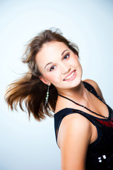 Fototapeta premium young beautiful disco dancer girl on blue