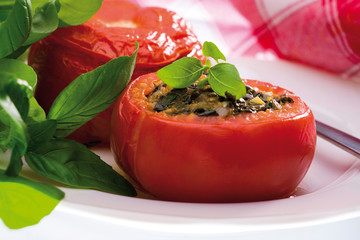 tomatoes stuffed with spinach - obrazy, fototapety, plakaty