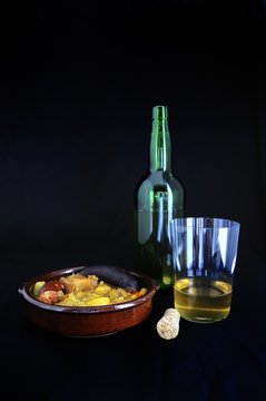 Sidra y pote de berzas.