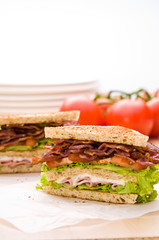 Two sandwich on wrapping paper