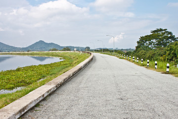 local road beside a dam