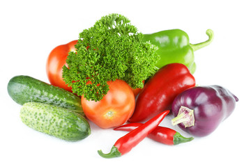 Vegetables and herbs on a white background