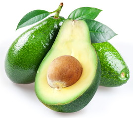Ripe avacados with leaves.