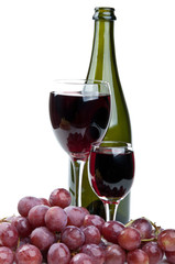 glass of wine and red grapes