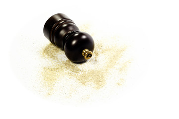 Pepper grinder with ground pepper