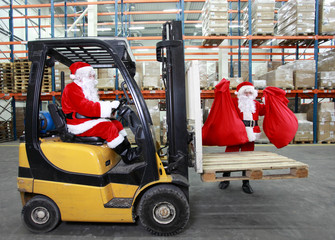 Santa clauses preparing for Christmas