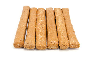 brown dog biscuits on a white background