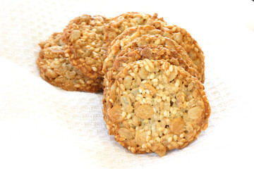 Whole grain biscuits on white background