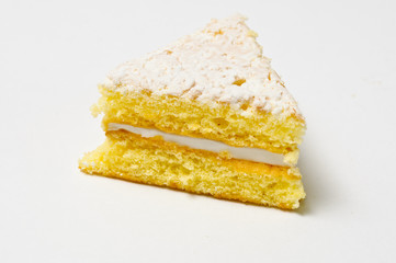 Side of the Triangle of sponge cookie with skimming filling