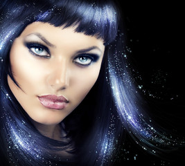 Beauty Brunette Girl with Magic Hair
