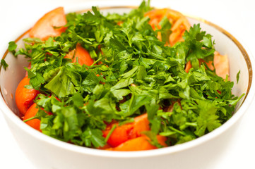 Fresh baby greens salad and tomatoes close up