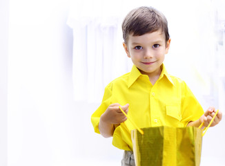 Little boy doing shopping