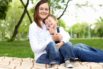 Mother with her son outside