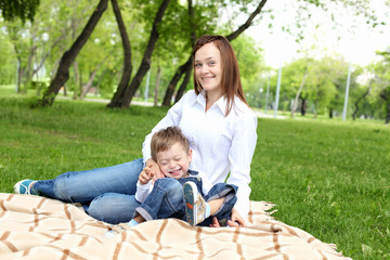Fototapeta premium Mother with her son outside