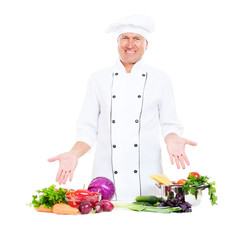 handsome senior chef with vegetables