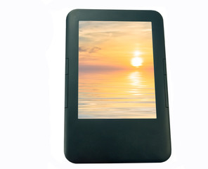 E-book with a color screen on the sunset